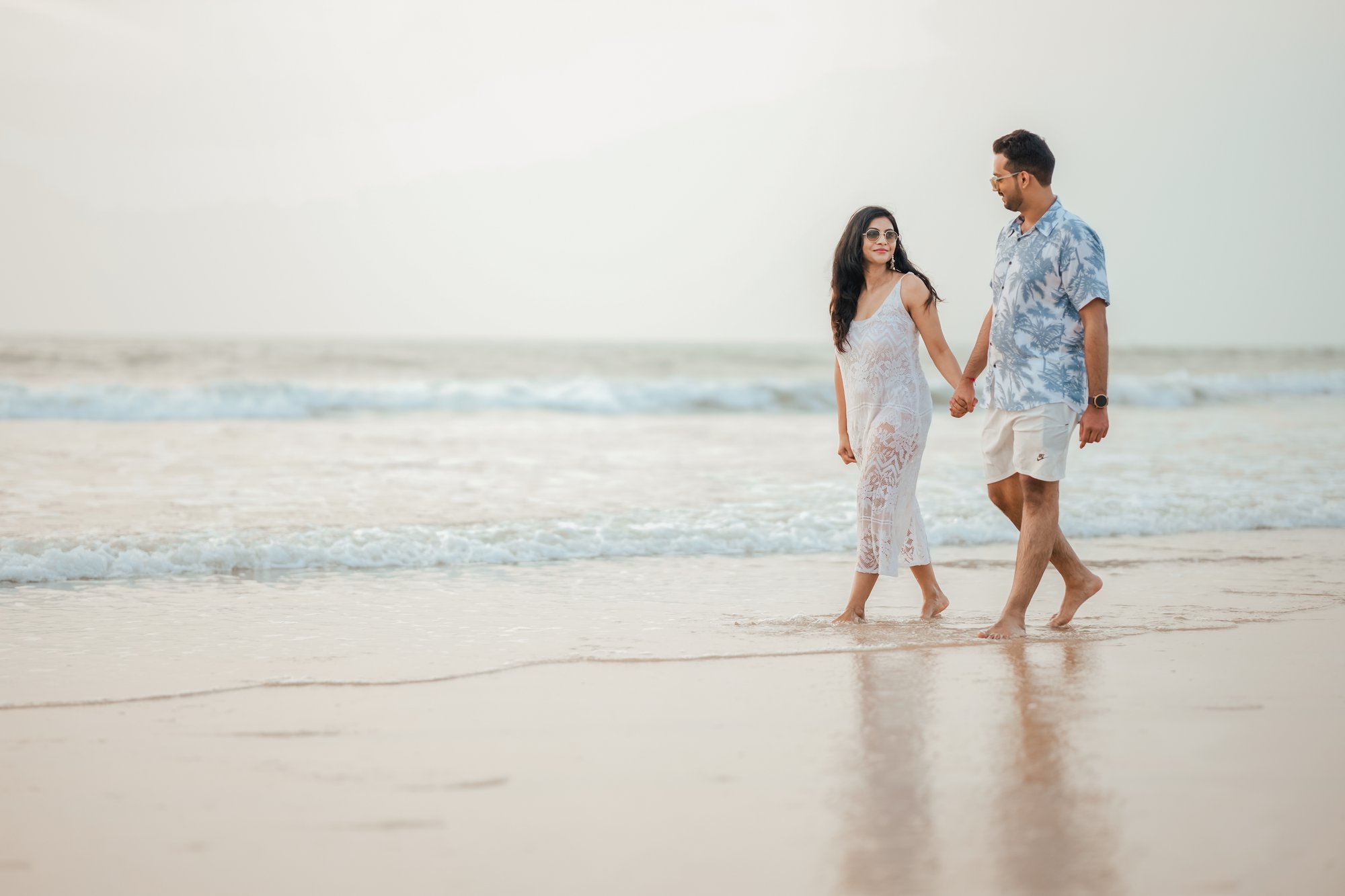 The golden-hour glow enhancing a couple’s dreamy pre-wedding photoshoot.